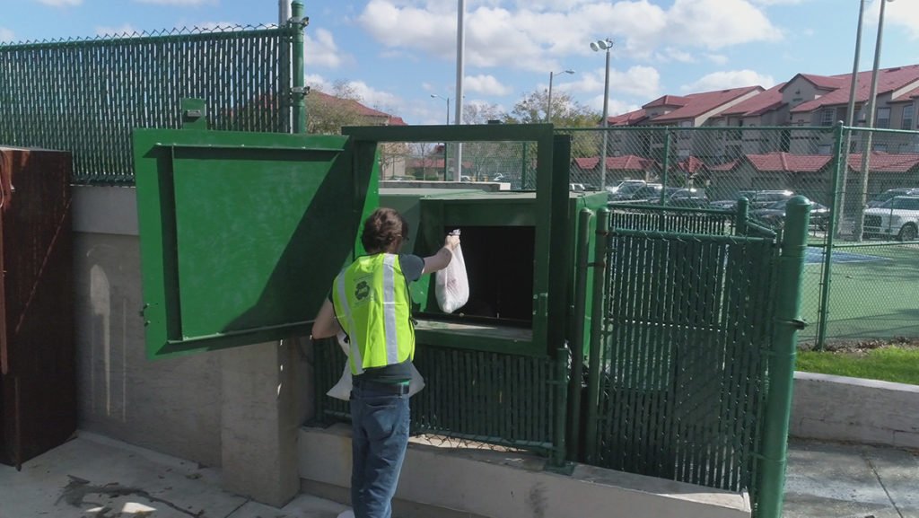 AWS employee collecting trash