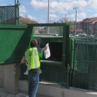 AWS employee collecting trash