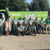 AWS employees in front of truck