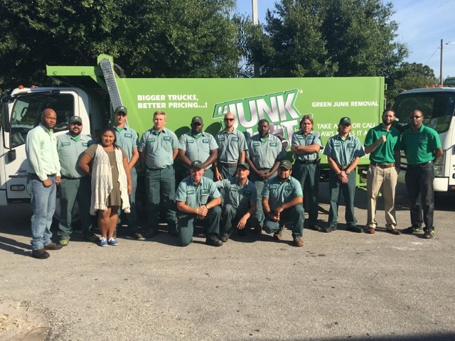 AWS employees in front of truck